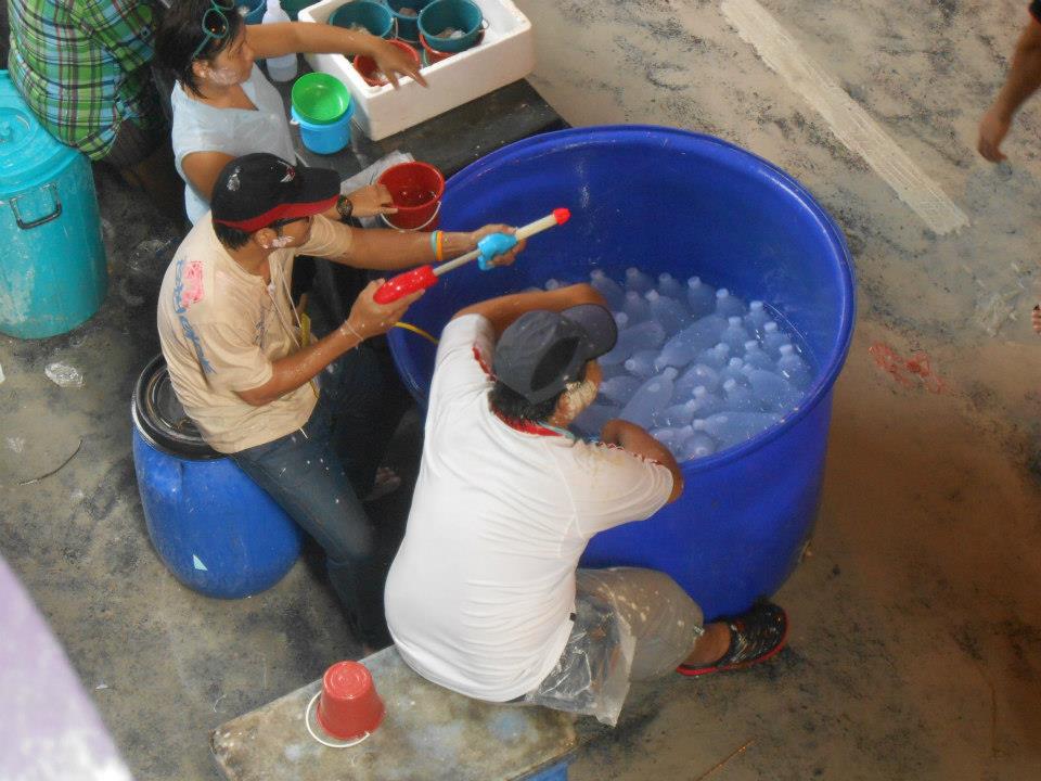 Thais selling extra water, and also preying on unsuspecting victims!